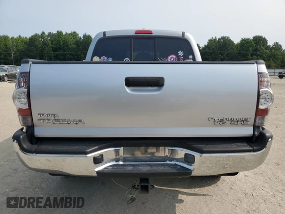 2009 Toyota Tacoma PreRunner with VIN 3TMJU62NX9M082642, listed as a Copart auction lot 57395705 with 160,365 mi miles and Salvage title. Bid and sale history available at DreamBid. Image 6.