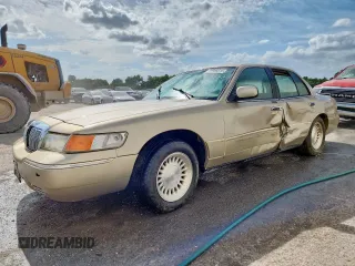 1999 Mercury Grand Marquis LS z VIN 2MEFM75WXXX684165, wystawiony jako Copart lot #59809515 z przebiegiem 240 976 mil mil oraz Szkoda całkowita • Salvage title. Historia ofert i sprzedaży dostępna na DreamBid. Obrazek 1.