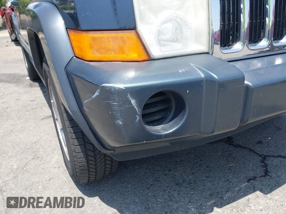 2007 Jeep Commander Sport with VIN 1J8HH48KX7C548033, listed as a IAAI auction lot 42555217 with 213,236 mi miles and . Bid and sale history available at DreamBid. Image 17.