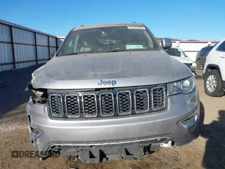 2018 Jeep Grand Cherokee Laredo E with VIN 1C4RJEAG9JC126080, listed as a IAAI auction lot 41355941 with 108,919 mi miles and . Bid and sale history available at DreamBid. Image 12.