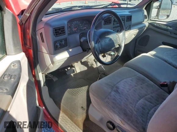 2000 Ford Super Duty F-250 XL with VIN 1FTNF21F3YEB90135, listed as a Copart auction lot 83629824 with 224,902 mi miles and Salvage Title. Bid and sale history available at carsss.com. Image 8.