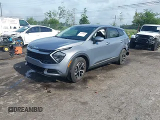 2024 Kia Sportage EX with VIN 5XYK33DF3RG185488, listed as a IAAI auction lot 42345457 with 33,926 mi miles and . Bid and sale history available at DreamBid. Image 2.
