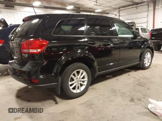 2015 Dodge Journey SXT with VIN 3C4PDDBG5FT518699, listed as a IAAI auction lot 41887477 with 118,966 mi miles and . Bid and sale history available at DreamBid. Image 4.