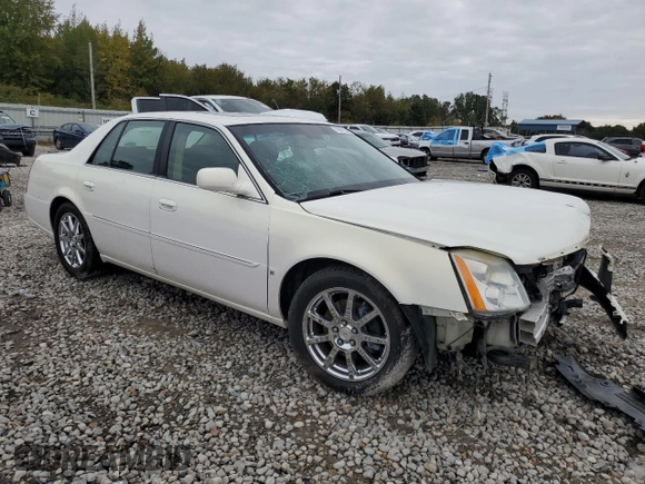 2007 Cadillac DTS Performance z VIN 1G6KD57907U171271, wystawiony jako Copart lot #79007574 z przebiegiem 147 504 mil mil oraz Szkoda całkowita • Salvage title. Historia ofert i sprzedaży dostępna na DreamBid. Obrazek 4.