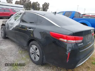 2017 Kia Optima Hybrid with VIN KNAGT4LEXH5014570, listed as a IAAI auction lot 41910017 with 126,532 mi miles. Bid and sale history available at carsss.com. Image 3.