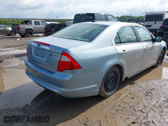2011 Ford Fusion Hybrid z VIN 3FADP0L30BR123857, wystawiony jako IAAI lot #42534556 z przebiegiem 144 811 mil mil oraz . Historia ofert i sprzedaży dostępna na DreamBid. Obrazek 4.