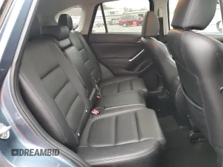 2016 Mazda CX-5 Grand Touring with VIN JM3KE4DY7G0761594, listed as a Copart auction lot 51514595 with 58,250 mi miles and Salvage Title. Bid and sale history available at DreamBid. Image 11.