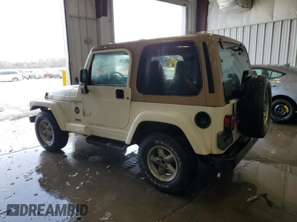 1999 Jeep Wrangler Sahara with VIN 1J4FY49S4XP428955, listed as a Copart auction lot 46001685 with 184,895 mi miles and Clean Title. Bid and sale history available at carsss.com. Image 2.