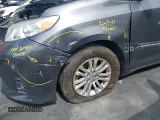 2015 Toyota Sienna XLE with VIN 5TDYK3DC2FS686969, listed as a IAAI auction lot 42559541 with 103,190 mi miles and . Bid and sale history available at DreamBid. Image 6.