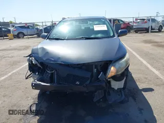 2009 Toyota Corolla with VIN 1NXBU40E69Z034459, listed as a IAAI auction lot 42095649 with 173,296 mi miles. Bid and sale history available at carsss.com. Image 12.