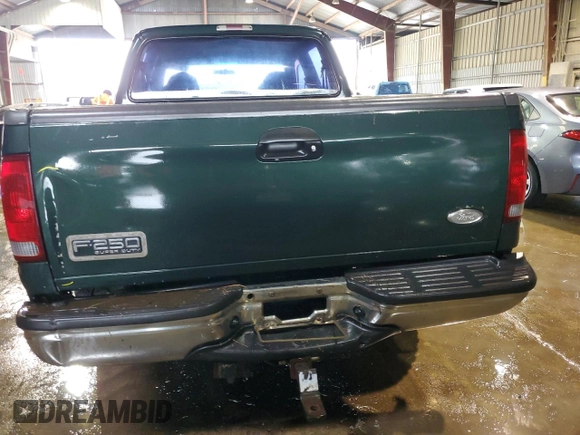2002 Ford F-250 XL with VIN 1FTNW20F52EA52699, listed as a Copart auction lot 84088814 with 299,869 mi miles and Salvage Title. Bid and sale history available at DreamBid. Image 6.