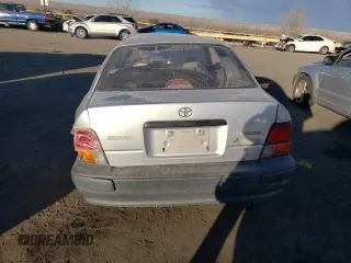 1996 Toyota Tercel DX z VIN JT2AC52L2T0193281, wystawiony jako Copart lot #85787774 z przebiegiem Nie podano mil oraz Szkody całkowita. Historia ofert i sprzedaży dostępna na DreamBid. Obrazek 6.