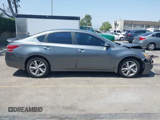 2015 Nissan Altima SV z VIN 1N4AL3AP1FC261692, wystawiony jako IAAI lot #42378146 z przebiegiem 215 563 mil mil oraz . Historia ofert i sprzedaży dostępna na DreamBid. Obrazek 13.