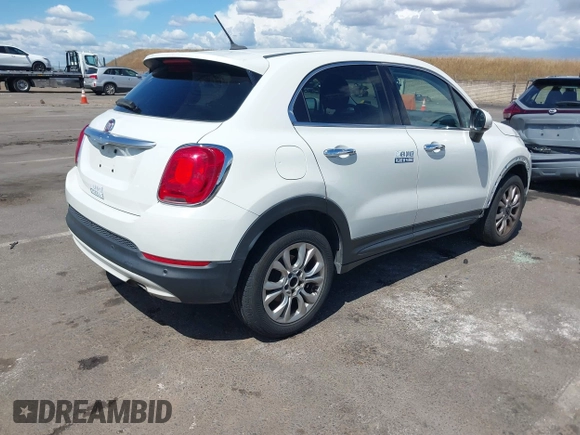 2016 FIAT 500X Lounge z VIN ZFBCFXDT0GP333273, wystawiony jako IAAI lot #42269130 z przebiegiem 98 707 mil mil oraz . Historia ofert i sprzedaży dostępna na DreamBid. Obrazek 4.