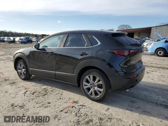 2021 Mazda CX-30 Select with VIN 3MVDMBBL1MM253743, listed as a Copart auction lot 48373625 with 59,466 mi miles and Salvage Title. Bid and sale history available at carsss.com. Image 2.