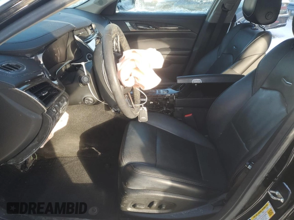 2016 Cadillac CTS AWD with VIN 1G6AW5SXXG0107872, listed as a Copart auction lot 87631955 with 51,624 mi miles and Salvage title. Bid and sale history available at DreamBid. Image 7.