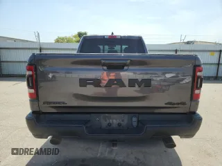 2019 Ram 1500 Rebel z VIN 1C6SRFET7KN875819, wystawiony jako Copart lot #57805775 z przebiegiem 80 521 mil mil oraz Szkoda całkowita • Salvage title. Historia ofert i sprzedaży dostępna na DreamBid. Obrazek 6.