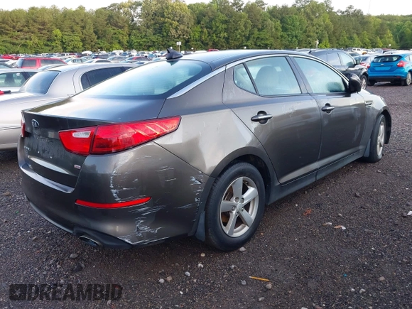 2015 Kia Optima LX z VIN 5XXGM4A79FG397995, wystawiony jako IAAI lot #42175785 z przebiegiem 159 239 mil mil oraz . Historia ofert i sprzedaży dostępna na DreamBid. Obrazek 6.