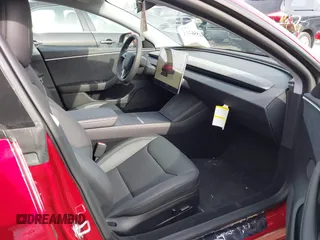 2025 Tesla Model 3 Long Range with VIN 5YJ3E1EB7SF890659, listed as a IAAI auction lot 41550353 with 1,004 mi miles and . Bid and sale history available at DreamBid. Image 5.