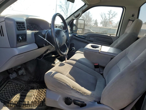 2001 Ford F-250 with VIN 3FTNF21L81MA77058, listed as a Copart auction lot 85871654 with 163,557 mi miles and Salvage title. Bid and sale history available at DreamBid. Image 7.