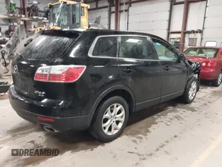 2011 Mazda CX-9 Sport with VIN JM3TB3BV9B0313270, listed as a IAAI auction lot 41474571 with 149,302 mi miles and . Bid and sale history available at DreamBid. Image 4.