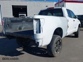 2010 Toyota Tundra 4WD Truck with VIN 5TFUW5F16AX102070, listed as a IAAI auction lot 41603206 with 214,742 mi miles. Bid and sale history available at carsss.com. Image 4.