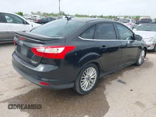 2013 Ford Focus Titanium with VIN 1FADP3J23DL152122, listed as a IAAI auction lot 41935180 with 175,065 mi miles and . Bid and sale history available at carsss.com. Image 4.