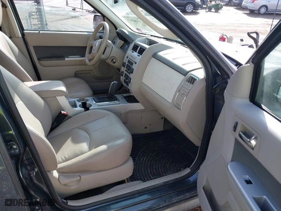2010 Mercury Mariner with VIN 4M2CN9BG0AKJ25786, listed as a IAAI auction lot 41650347 with 144,035 mi miles. Bid and sale history available at carsss.com. Image 5.