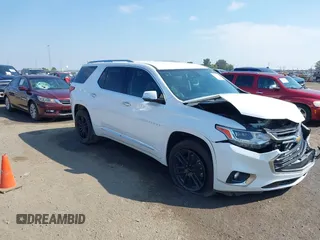 2018 Chevrolet Traverse Premier z VIN 1GNERKKW6JJ220965, wystawiony jako IAAI lot #37625637 z przebiegiem 99 072 mil mil oraz . Historia ofert i sprzedaży dostępna na DreamBid. Obrazek 1.