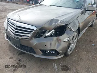 2010 Mercedes-Benz E with VIN WDDHF5GB2AA115447, listed as a IAAI auction lot 42068721 with 133,081 mi miles. Bid and sale history available at carsss.com. Image 6.