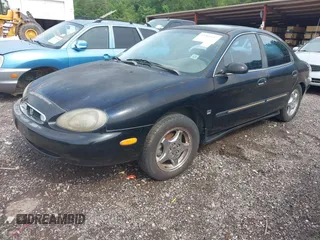 1999 Mercury Sable LS Premium Group z VIN 1MEFM53S7XA632876, wystawiony jako IAAI lot #42303137 z przebiegiem 178 617 mil mil oraz . Historia ofert i sprzedaży dostępna na DreamBid. Obrazek 2.