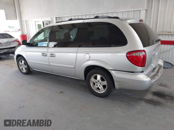 2005 Dodge Caravan SXT with VIN 2D4GP44L65R335656, listed as a IAAI auction lot 42526728 with 322,176 mi miles and . Bid and sale history available at DreamBid. Image 3.