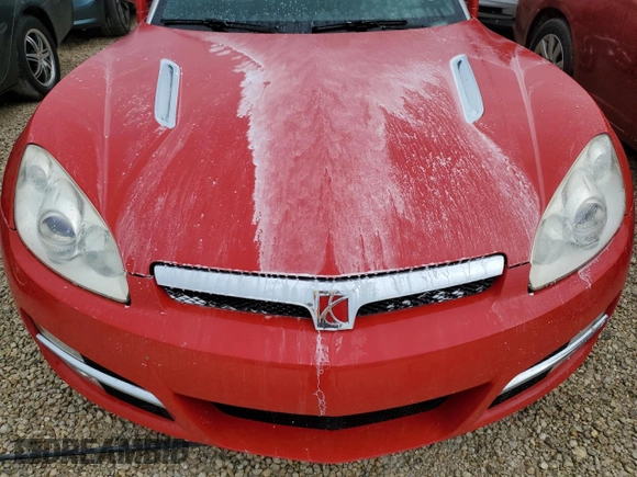 2009 Saturn Sky z VIN 1G8MN35B79Y103875, wystawiony jako Copart lot #74669844 z przebiegiem Nie podano mil oraz Szkody całkowita. Historia ofert i sprzedaży dostępna na DreamBid. Obrazek 11.