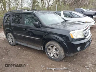 2009 Honda Pilot Touring with VIN 5FNYF48959B016978, listed as a IAAI auction lot 41947782 with 234,115 mi miles and . Bid and sale history available at carsss.com. Image 1.
