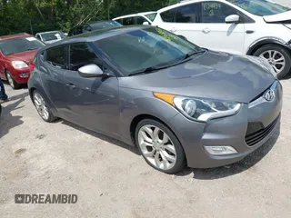 2015 Hyundai Veloster with VIN KMHTC6AD5FU229487, listed as a IAAI auction lot 42688531 with 98,682 mi miles and . Bid and sale history available at DreamBid. Image 1.