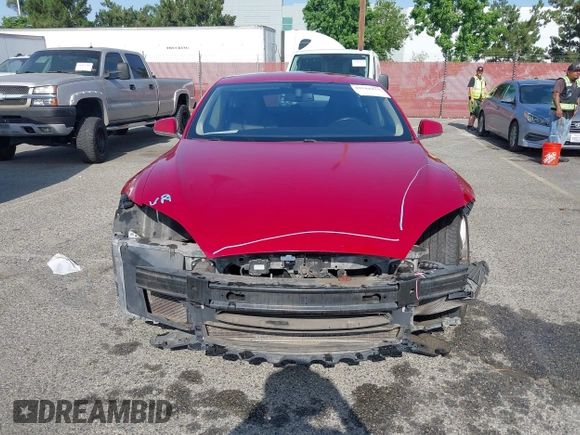 2014 Tesla Model S 60 z VIN 5YJSA1H16EFP42727, wystawiony jako IAAI lot #42544475 z przebiegiem 166 877 mil mil oraz . Historia ofert i sprzedaży dostępna na DreamBid. Obrazek 13.