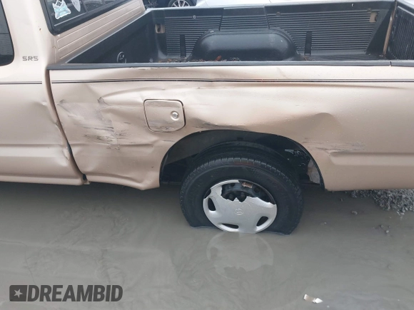 1999 Toyota Tacoma with VIN 4TAVL52N4XZ524059, listed as a IAAI auction lot 41761806 with 214,425 mi miles and . Bid and sale history available at DreamBid. Image 6.