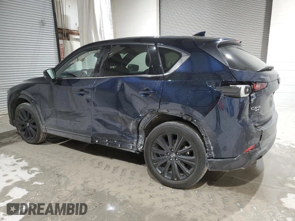 2022 Mazda CX-5 2.5 Turbo with VIN JM3KFBAY1N0636626, listed as a Copart auction lot 52257685 with 41,329 mi miles and Salvage Title. Bid and sale history available at carsss.com. Image 2.