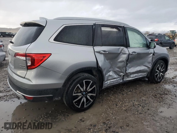 2020 Honda Pilot Touring 8-Passenger with VIN 5FNYF6H9XLB042625, listed as a Copart auction lot 86412804 with 52,061 mi miles and Salvage Title. Bid and sale history available at DreamBid. Image 3.