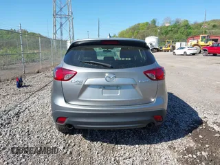 2013 Mazda CX-5 Sport with VIN JM3KE4BE0D0125748, listed as a IAAI auction lot 42143020 with 158,580 mi miles. Bid and sale history available at carsss.com. Image 16.