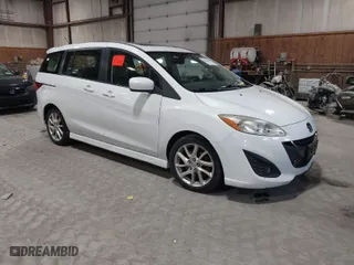 2012 Mazda Mazda5 Grand Touring with VIN JM1CW2DL9C0100114, listed as a IAAI auction lot 42038998 with 160,651 mi miles. Bid and sale history available at carsss.com. Image 1.