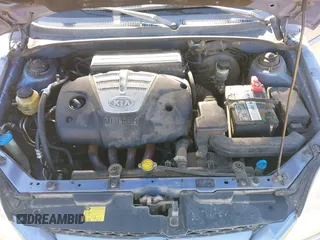 2004 Kia Rio with VIN KNADC165546190976, listed as a IAAI auction lot 41412051 with 186,378 mi miles. Bid and sale history available at carsss.com. Image 10.