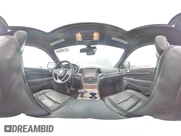 2015 Jeep Grand Cherokee Summit with VIN 1C4RJFJG2FC913658, listed as a Copart auction lot 52160035 with 138,008 mi miles and Salvage Title. Bid and sale history available at DreamBid. Image 14.
