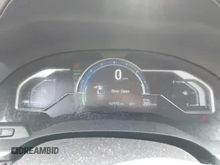 2018 Honda Clarity with VIN JHMZC5F12JC013732, listed as a IAAI auction lot 42157758 with 162,470 mi miles. Bid and sale history available at carsss.com. Image 7.