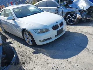 2007 BMW 3 Series 335i with VIN WBAWB73557P031442, listed as a IAAI auction lot 42123815 with Not Provided miles and . Bid and sale history available at carsss.com. Image 1.