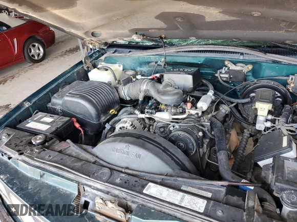 1997 GMC Sierra 1500 z VIN 2GTEK19RXV1501674, wystawiony jako Copart lot #59061595 z przebiegiem 138 998 mil mil oraz Szkoda całkowita • Salvage title. Historia ofert i sprzedaży dostępna na DreamBid. Obrazek 11.