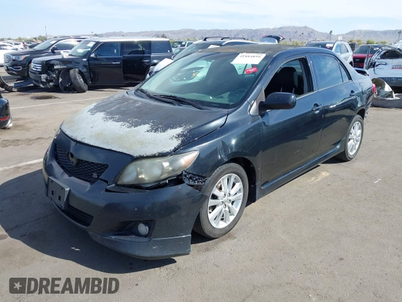 2010 Toyota Corolla with VIN 1NXBU4EE2AZ299148, listed as a IAAI auction lot 41884899 with 303,174 mi miles. Bid and sale history available at carsss.com. Image 17.