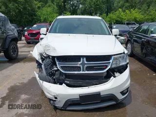 2019 Dodge Journey SE with VIN 3C4PDCBB6KT833777, listed as a IAAI auction lot 42411738 with 32,133 mi miles and . Bid and sale history available at DreamBid. Image 12.