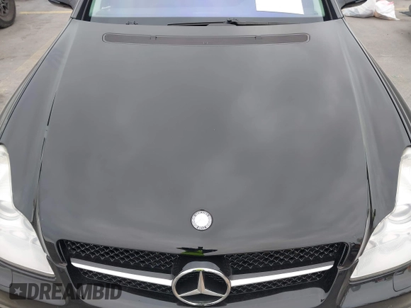 2009 Mercedes-Benz CLS-Class 5.5L with VIN WDDDJ72X99A141289, listed as a IAAI auction lot 41436528 with 126,649 mi miles. Bid and sale history available at carsss.com. Image 6.