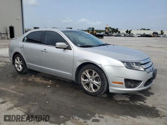 2012 Ford Fusion SE z VIN 3FAHP0HA1CR218938, wystawiony jako Copart lot #59588135 z przebiegiem 111 243 mil mil oraz Szkoda całkowita • Salvage title. Historia ofert i sprzedaży dostępna na DreamBid. Obrazek 4.